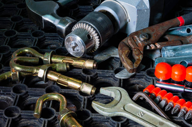 istock Electric drill and anchor bolts. 1302083472