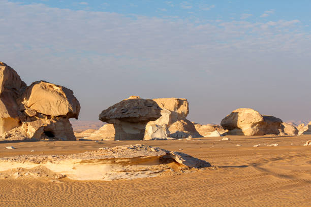 istock Bizarre sandstone formations in the white desert, early morning 1302084878