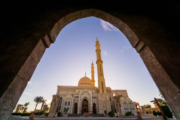 istock Beautiful large Islamic mosque at the sky background 1302085560