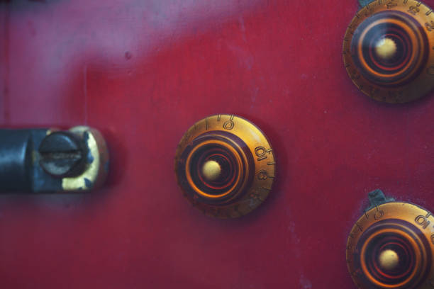 Detail shot of vintage guitar amplifier and cables