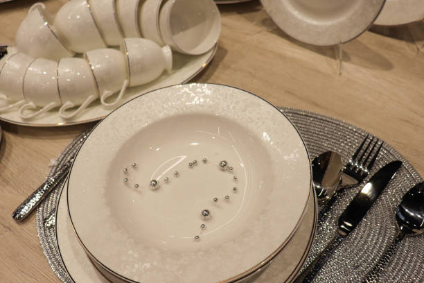 istock a set of beautiful dishes for a festive table setting. porcelain service 1302092944