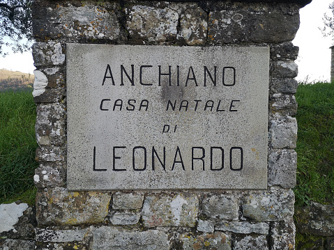 Sign on wall at Anchiano, with the home birthplace of Renaissance polymath Leonardo da Vinci, Vinci. Florence province, Tuscany