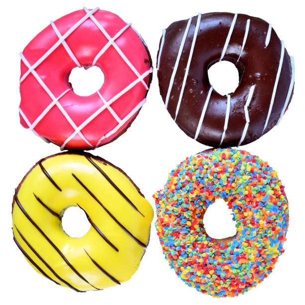 istock Donuts in multicolored glaze isolated on white background. 1302098576