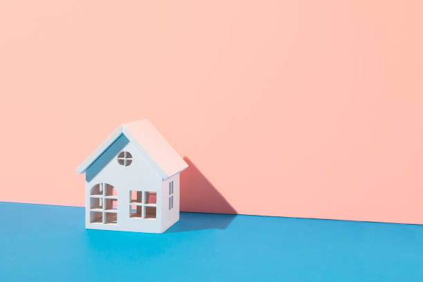 istock Mortgage Concept with Wooden Home Model 1302098798