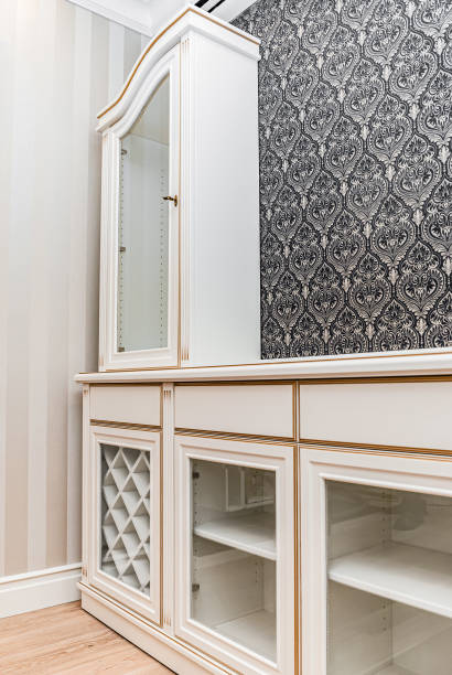istock Classical style white showcase with glass doors and gilding 1302101756