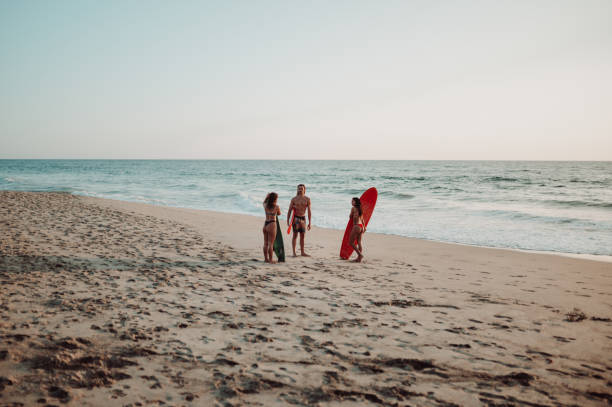 istock Friends at the beach 1302101878