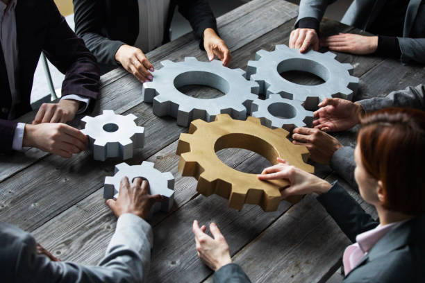 istock Business people connect gear 1302105775