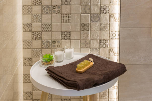 istock In bathroom towel and scrubbing brush 1302107088