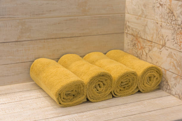 istock Four towels in the bathroom or spa 1302107094