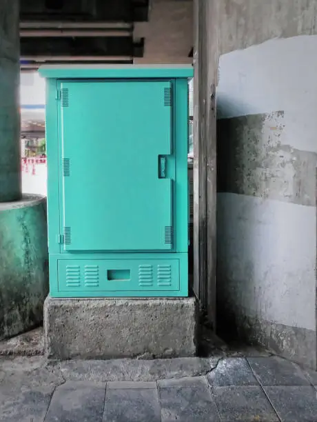 Green Blue Electrical Control Cabinet at the Corner of Street