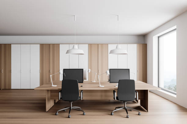istock White and wooden open space office, front view 1302108240
