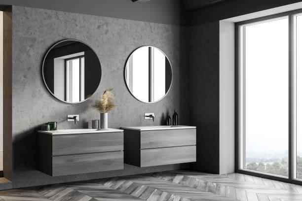 istock Gray and wooden bathroom corner with double sink 1302108269