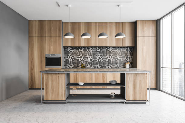 istock Wooden kitchen interior with cupboards and island 1302108275