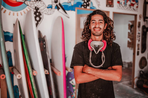 istock Portrait of young surfboard maker 1302110326