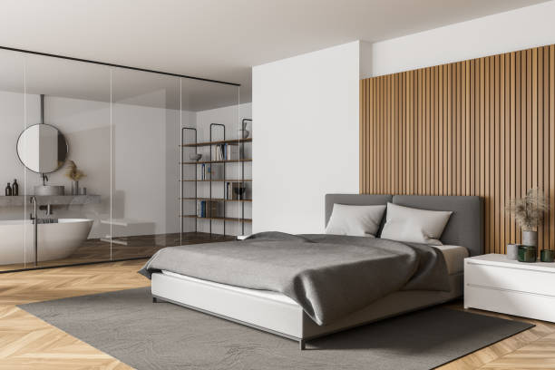 istock White and wooden bedroom and bathroom corner 1302110615