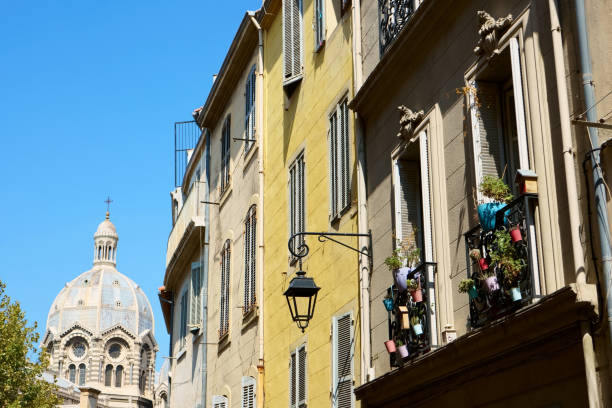 Facade of provence style building in Marseille Facade of provence style building in Marseille marseille panier stock pictures, royalty-free photos & images