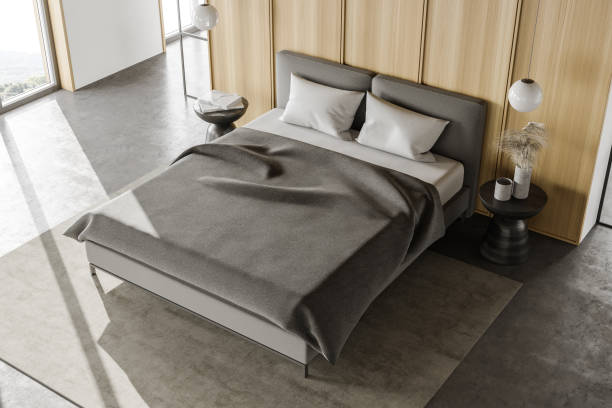 istock White and wooden master bedroom interior, top view 1302111920