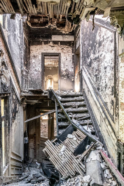Staircase of burnt down house, heavy decay Staircase of burnt down house, heavy decay abandoned place stock pictures, royalty-free photos & images