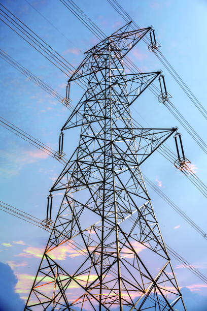 istock High voltage transmission towers line 1302118648