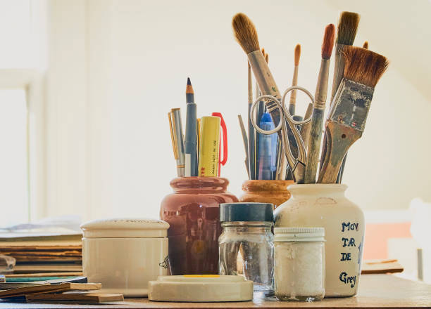 istock Collection of drawing and writing tools on a desk 1302118682