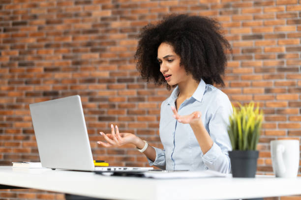 istock Young woman discussing a new work strategy 1302119764