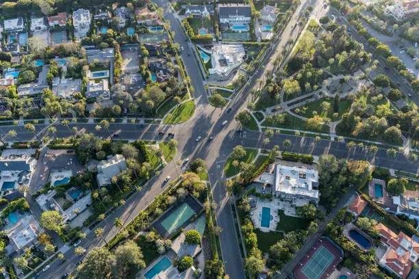 Aerial view of six way intersection at N Beverly Drive and N Canon Drive and Lomitas Ave in Beverly Hills, California.