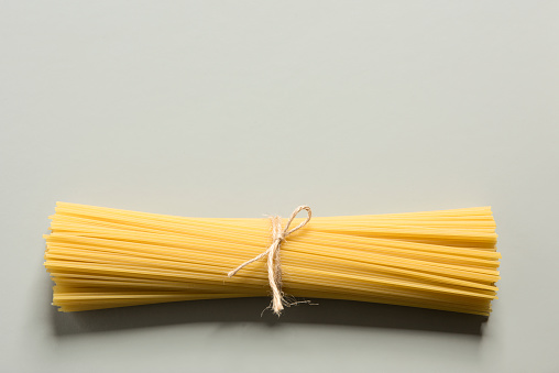 Spaghetti Pasta On Grey Background