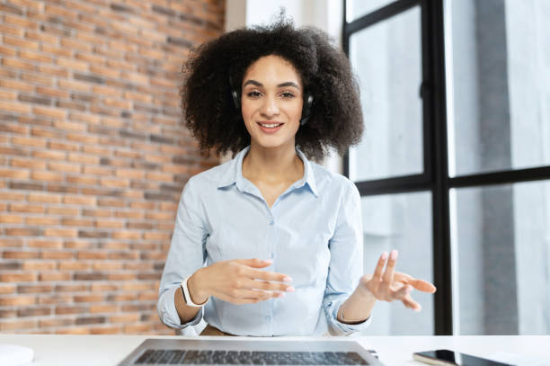 istock Young woman chatting with headset 1302119936