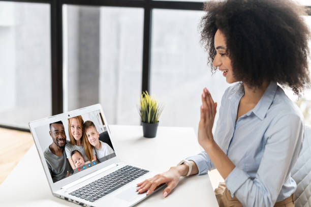 istock Young mixed-race businesswoman video-calling 1302120044