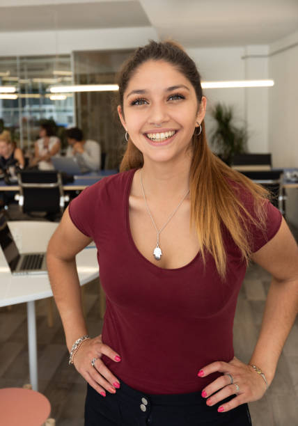 istock Young business woman in co-working area 1302121249