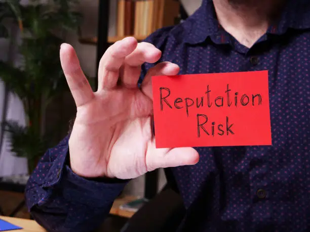 Photo of Reputation risk is shown on the conceptual photo using the text