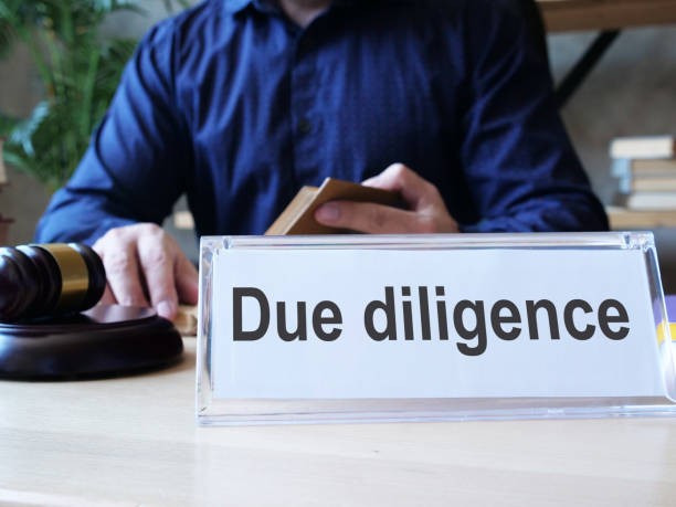 istock Due diligence is shown on the conceptual photo 1302121311