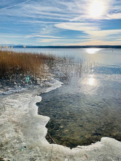 istock Winter landscape at the lake, ice 1302122396