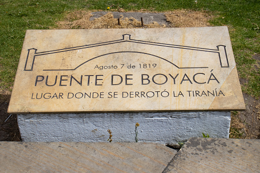 Commemorative plaque at the famous historic Bridge of Boyaca in Colombia. You can read : \