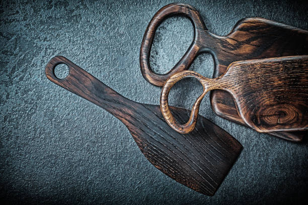istock vintage wood kitchen utensils on dark backfround 1302123602