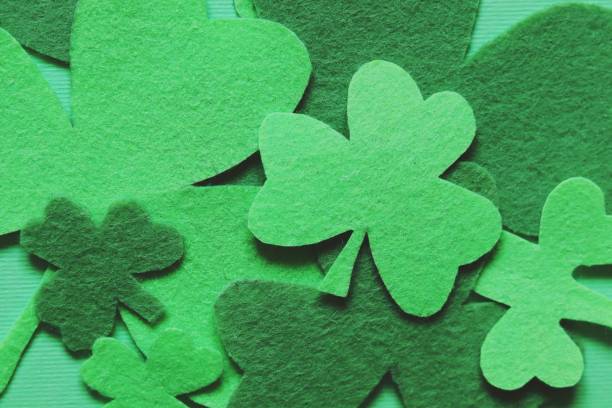 istock Saint Patrick's Day, decorative clover leaves, top view, background for congratulations 1302123862