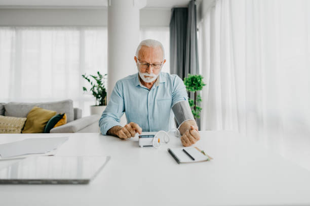 istock Senior man checking his blood pressure 1302125734