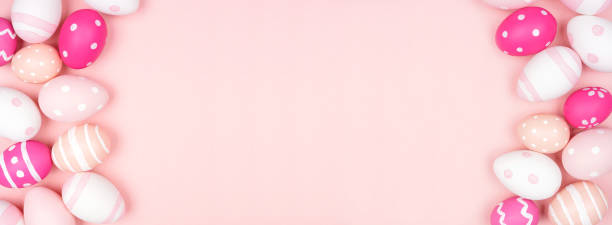 istock Pink and white Easter Egg double border over a pink banner background 1302126043