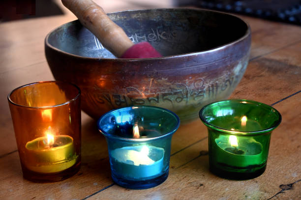 Wooden table. Lighted candles making a special atmosphere