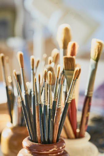 A collection of old sable paintbrushes