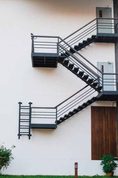 istock Modren fire escape on building ,safety stair. 1302129229