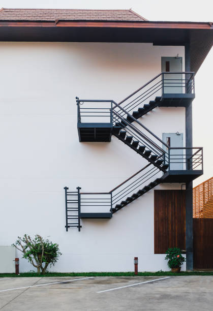 istock Modren fire escape on building ,safety stair. 1302129230