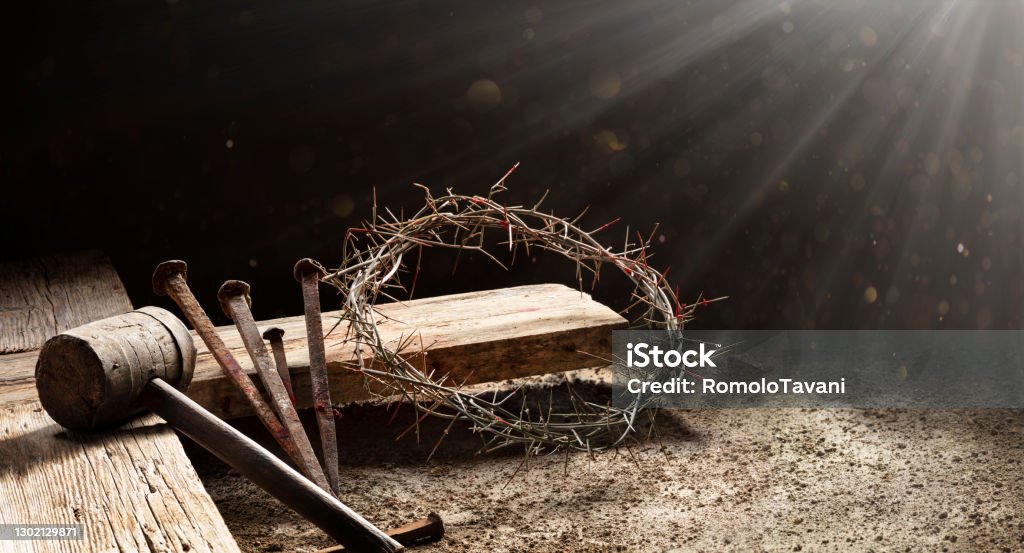 Passion Of Jesus  - Wooden Cross With Crown Of Thorns Hammer And Bloody Spikes Calvary Of Jesus  - Old Cross With Crown Of Thorns Hammer And Bloody Spikes Jesus Christ Stock Photo