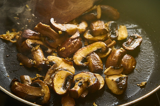 Close-up of Mushrroms Frying in a Pan