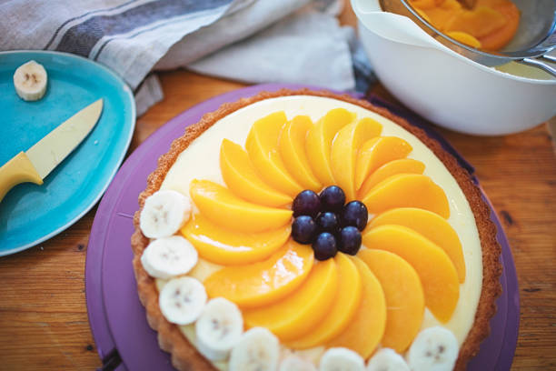 istock Baking fruit cakes in the kitchen with appliances 1302137120