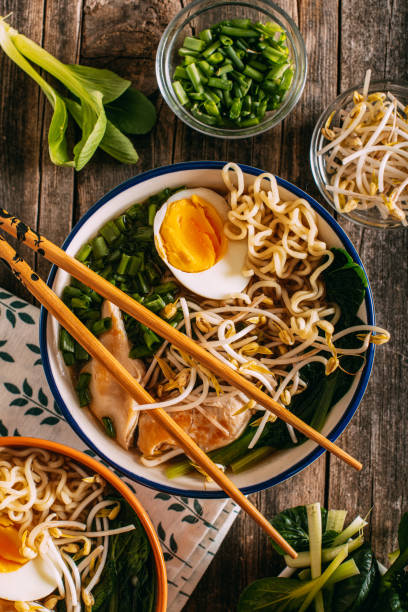istock Ramen Soup on Rustic Wooden Table 1302137881