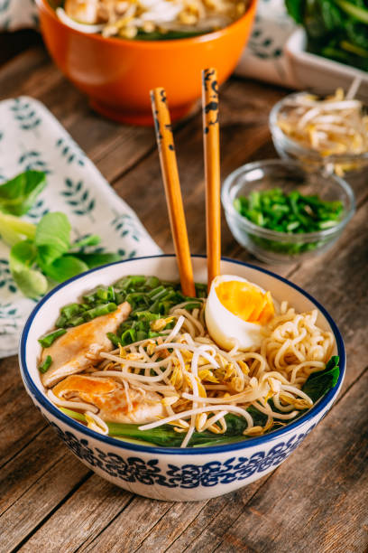 istock Homemade Ramen Soup on Rustic Wooden Table 1302138466