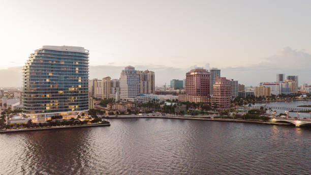 Aerial Drone View of Downtown West Palm Beach, Florida Inlet Waterfront at Sunset in February of 2021 Aerial Footage of Downtown West Palm Beach, Florida Inlet Waterfront at Sunset in February of 2021. west palm beach stock pictures, royalty-free photos & images