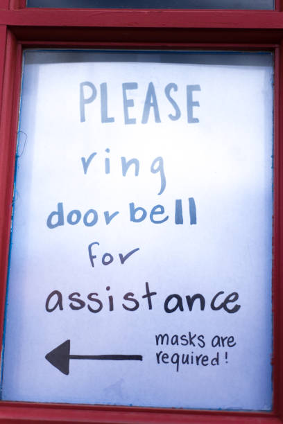istock COVID Sign: Please Ring Doorbell for Assistance 1302146694