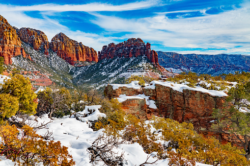 View of Bridge Mountain and the Sentinel Peak after snowfall near the Human History Museum in Zion National Park Utah in winter